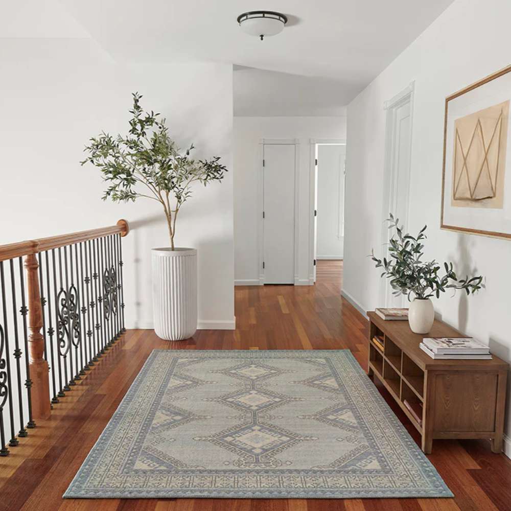Styled in a hallway, the Momeni Anatolia Indoor Rug - ANA-10 Blue enhances the space with its timeless design and calming blue palette
