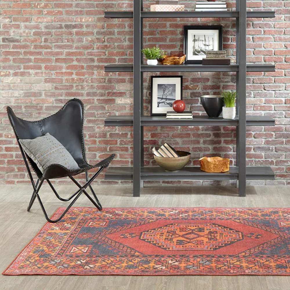Styled in a modern loft setting, Momeni Afshar Indoor Rug - AFS16 Red adds warmth and character with its classic Persian-inspired design