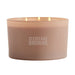 Suede brown three-wick Crate & Barrel Monochrome Scented Candle featuring Cleveland Browns lettering on the wide glass vessel
