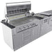 Sunstone French Quarter 13ft 7in Outdoor Kitchen Island Package displays an open grill with cooking grates, side burner, and control knobs