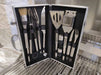 Sunstone 10 Piece Stainless Steel BBQ Tool Set w Carry Case is opened on a grill, showing neatly arranged tools including a spatula, tongs, knives, and basting brush