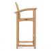Tall teak bar stool with curved arms and a slatted back from Westminster Teak Somerset 5pc Teak High Bar Set is shown from the side with a sturdy footrest