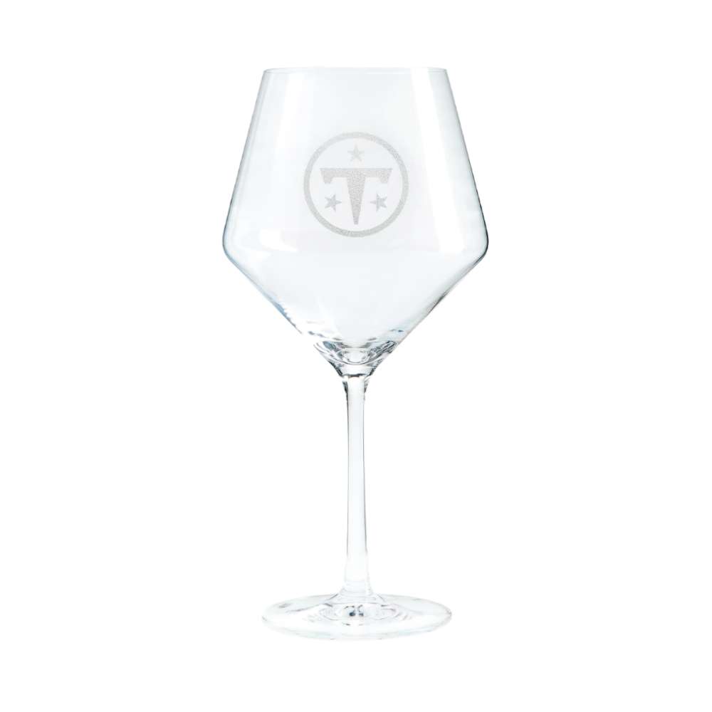 Tennessee Titans Crate & Barrel NFL Tour 24oz Red Wine Glass, Set of 4 featuring the Titans circular T and three-star logo etched on a clear stemmed wine glass
