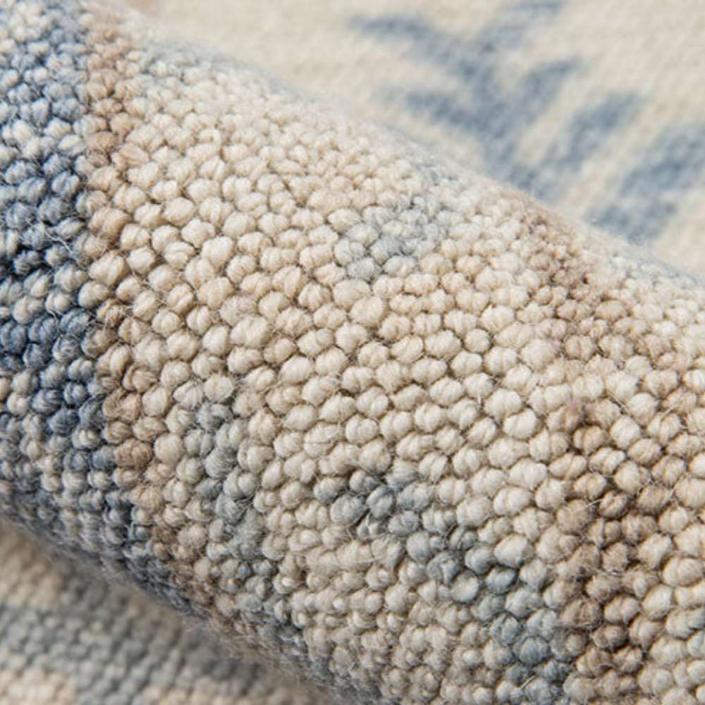 Textured surface of Momeni Anatolia Indoor Rug - ANA-1 Blue highlights its durable looped weave construction