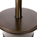The round bronze tabletop built into Outdoor Order Halo Traditional Heater wraps around the pole above the base