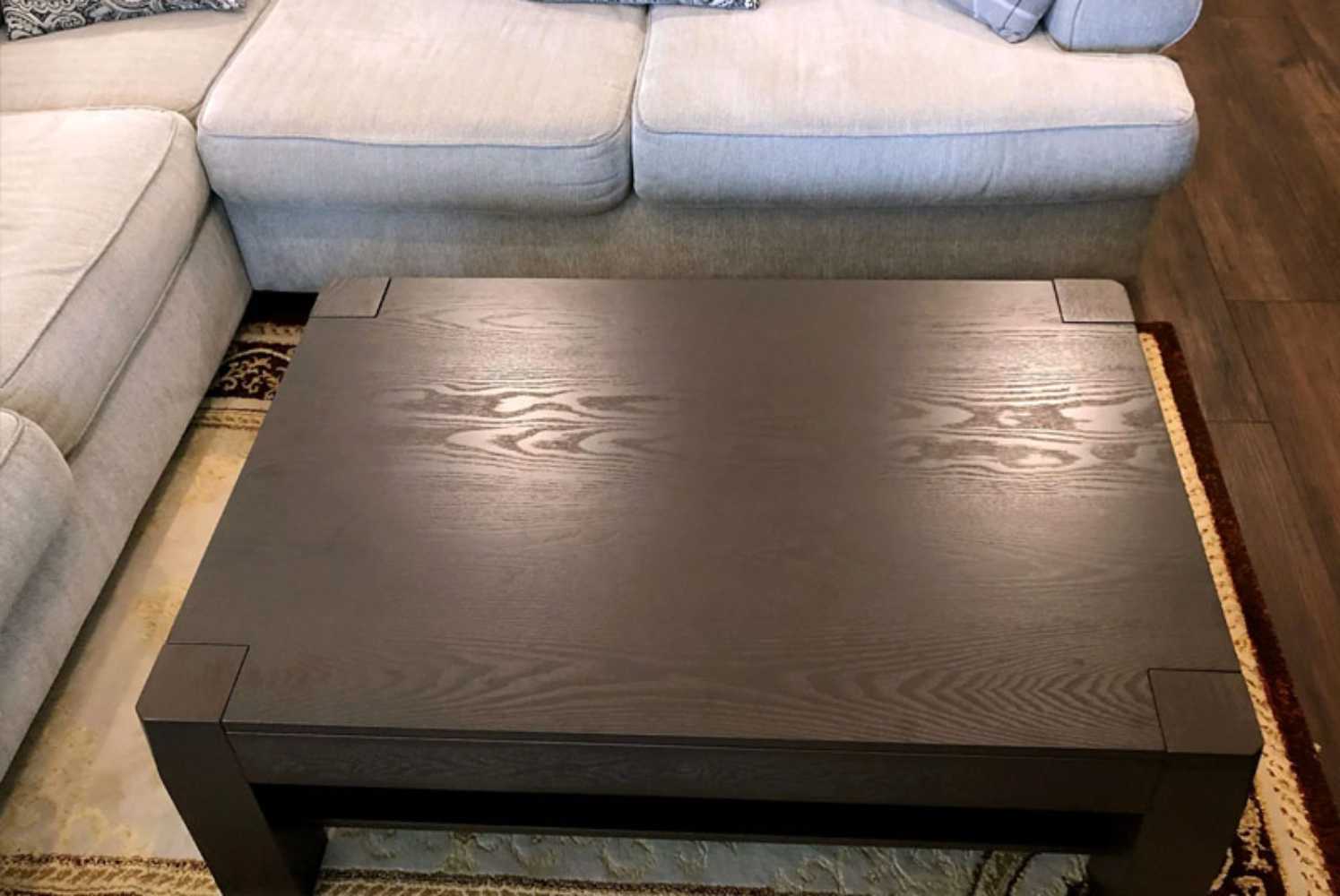 The Game Theory Tables The Origins Coffee Table in a living room setting