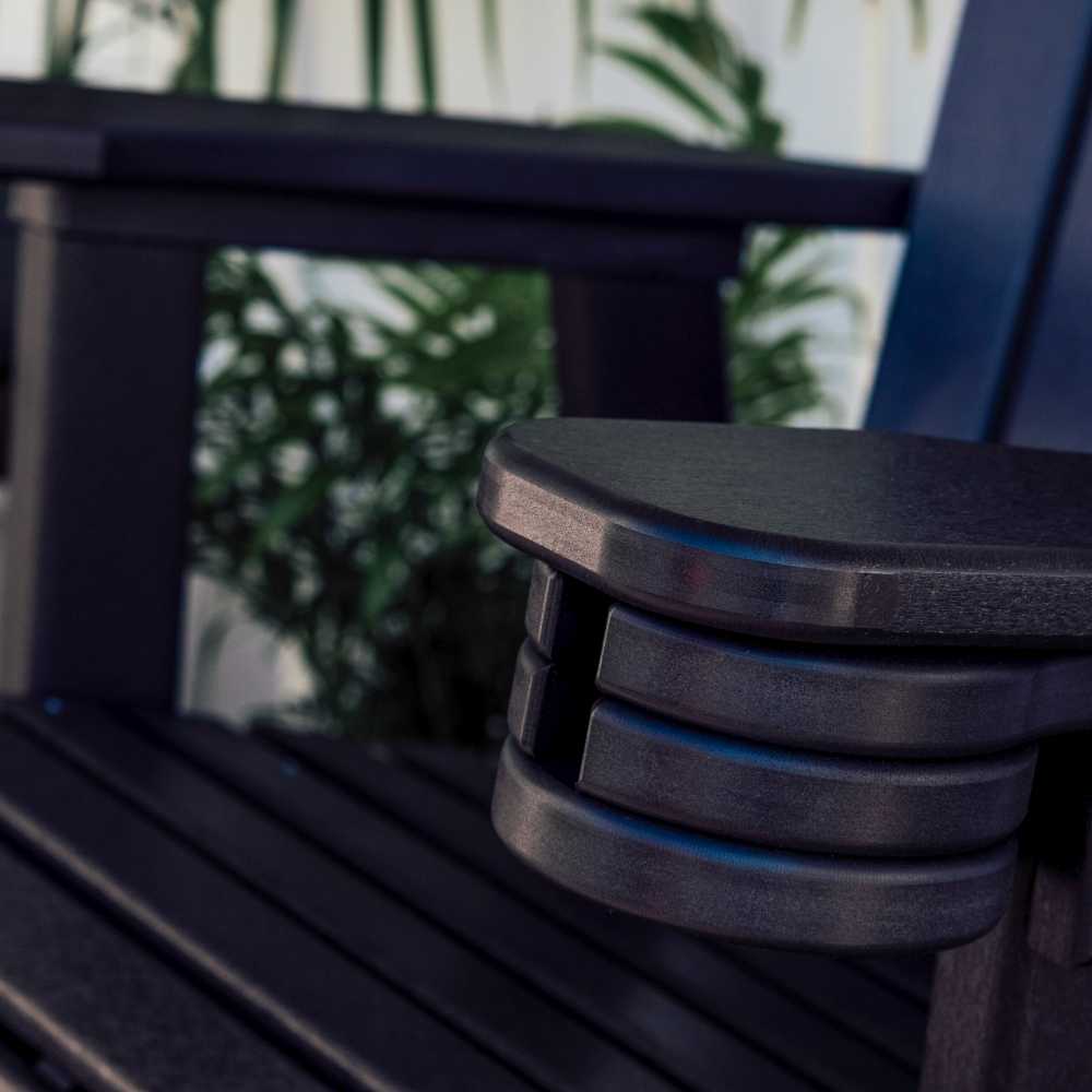 The LuxCraft Slideout Cup Holder in black is shown retracted blending into the armrest of the chair