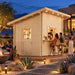 he Lakeside Versa Cabana 67 Freedom Bar illuminated on a clear Nevada night, with adults socializing at the serving counter and relaxing beside a fire bowl.