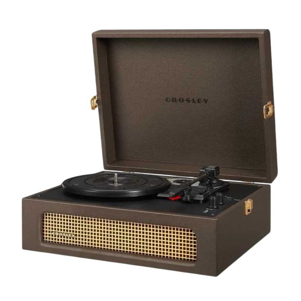 The angled view of the Crosley Voyager Portable Turntable with Bluetooth Out - Cocoa showcases its elegant cocoa finish, compact design, and easy-to-use controls