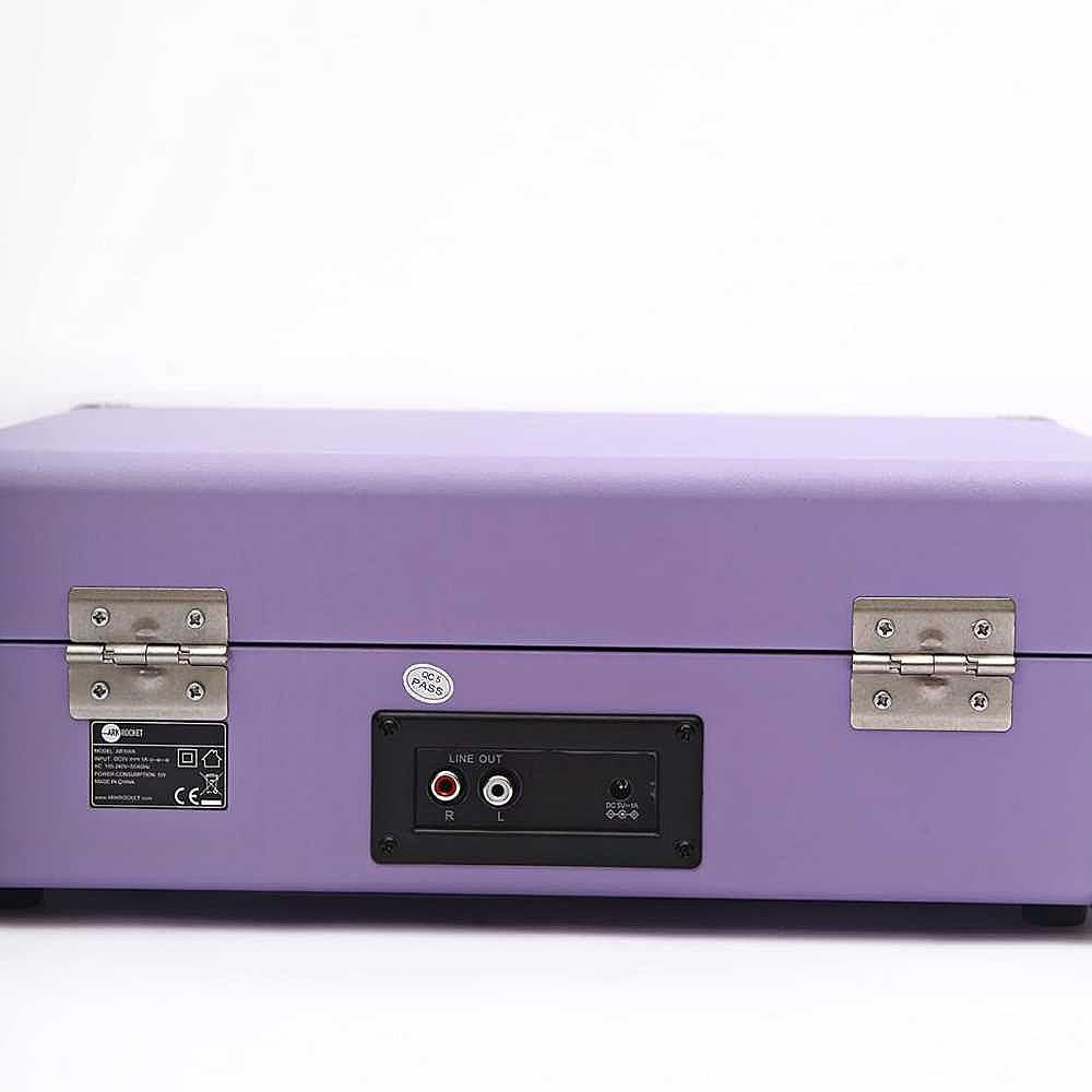 The back view of the Arkrocket Curiosity Suitcase Bluetooth Turntable (Lavender) shows a lavender suitcase design with metal hinges and audio line-out ports