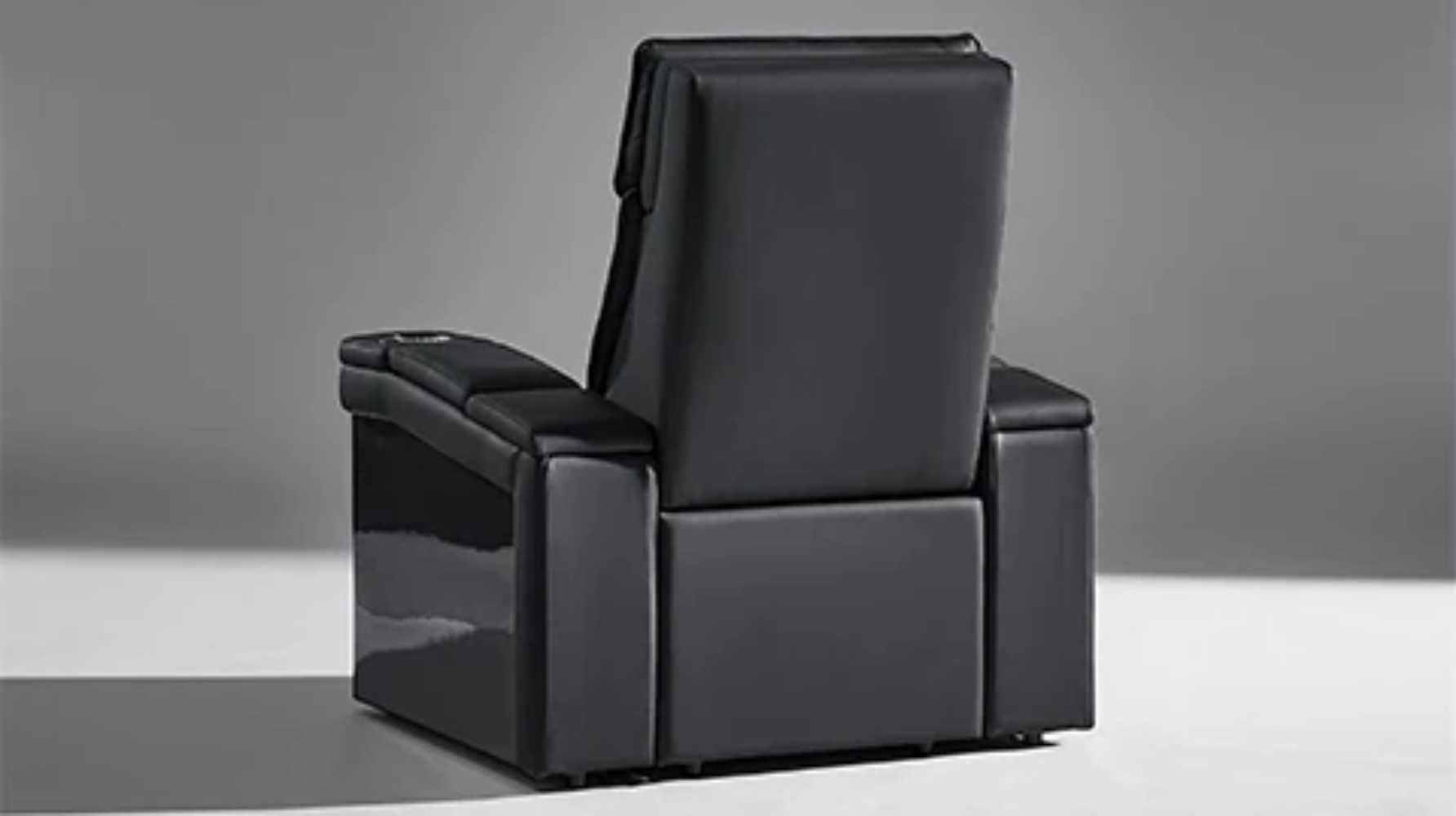 The back view of the Valencia Monza Pillow Top Carbon Fiber Home Theater Seating