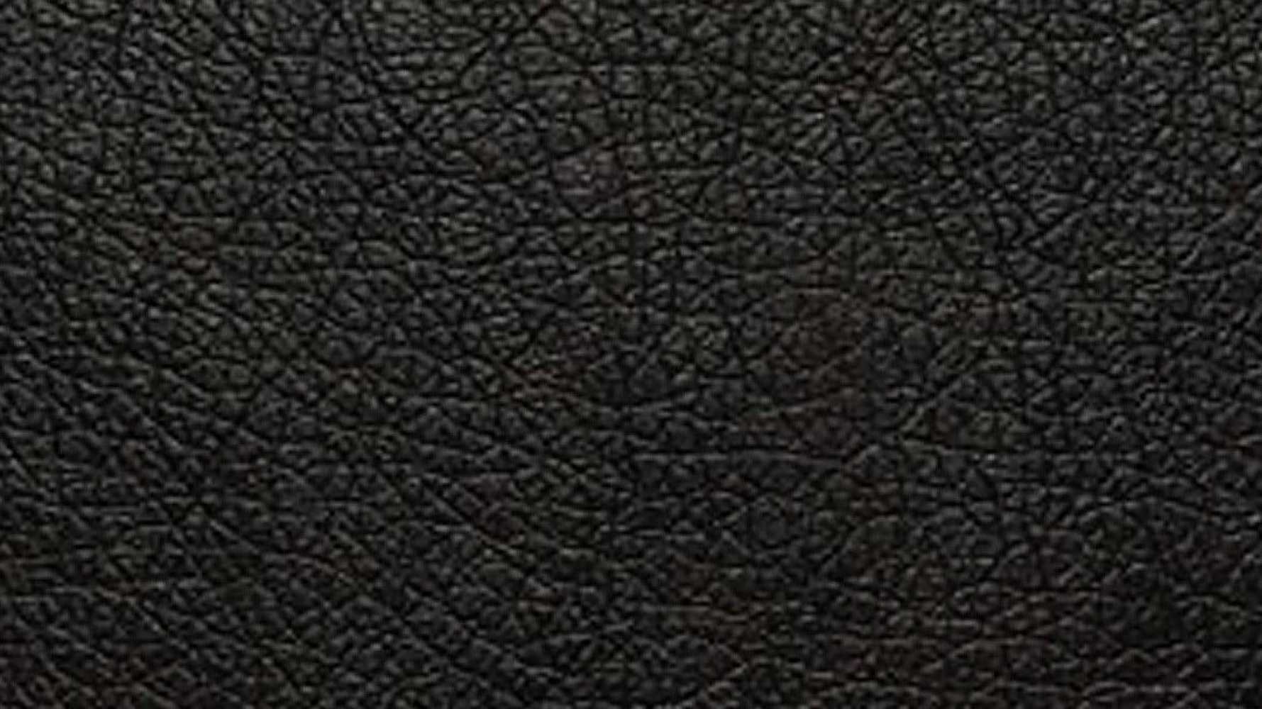 The black leather surface of the Valencia Verona Home Theater Seating features a finely textured