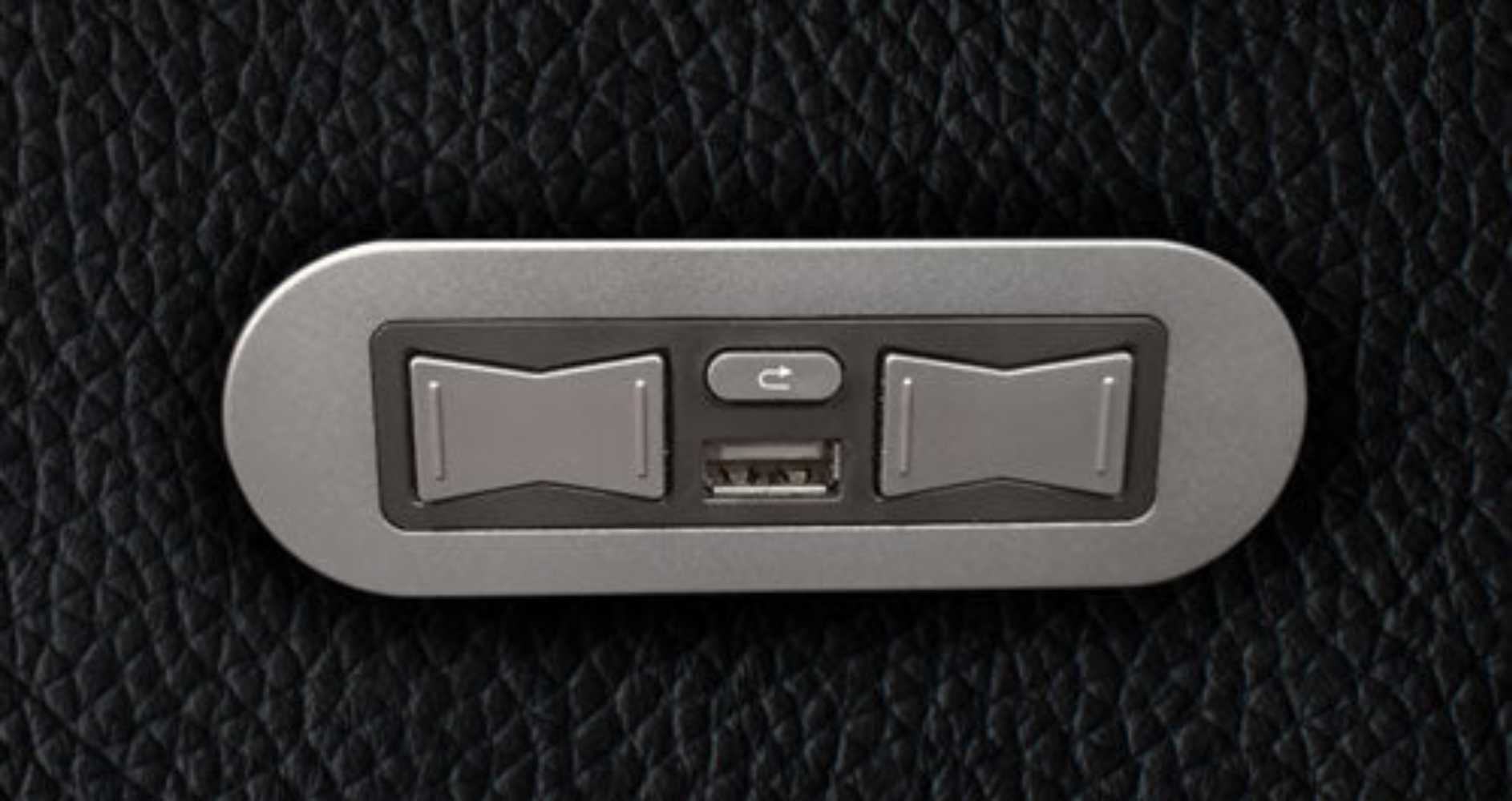 The built-in control buttons of the Valencia Piacenza Power Headrest Edition Home Theater Seating