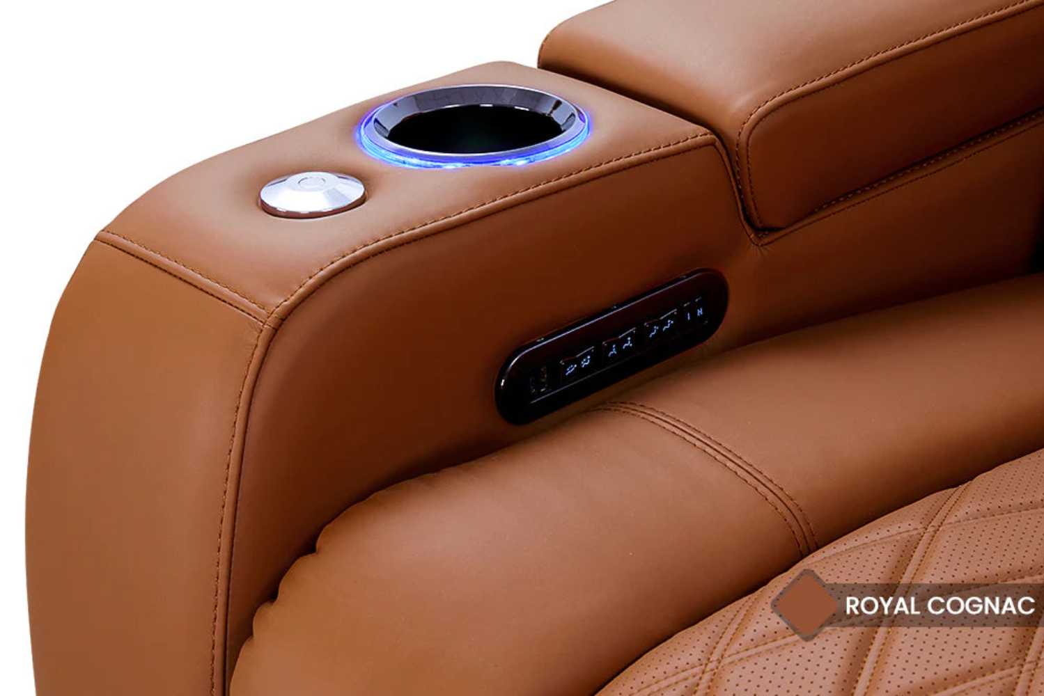 The control panel and illuminated cup holder on the royal cognac armrest of the Valencia Tuscany Ultimate Edition Home Theater Seating