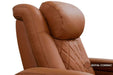 The ergonomic and plush adjustable headrest in royal cognac on the Valencia Tuscany Ultimate Edition Home Theater Seating