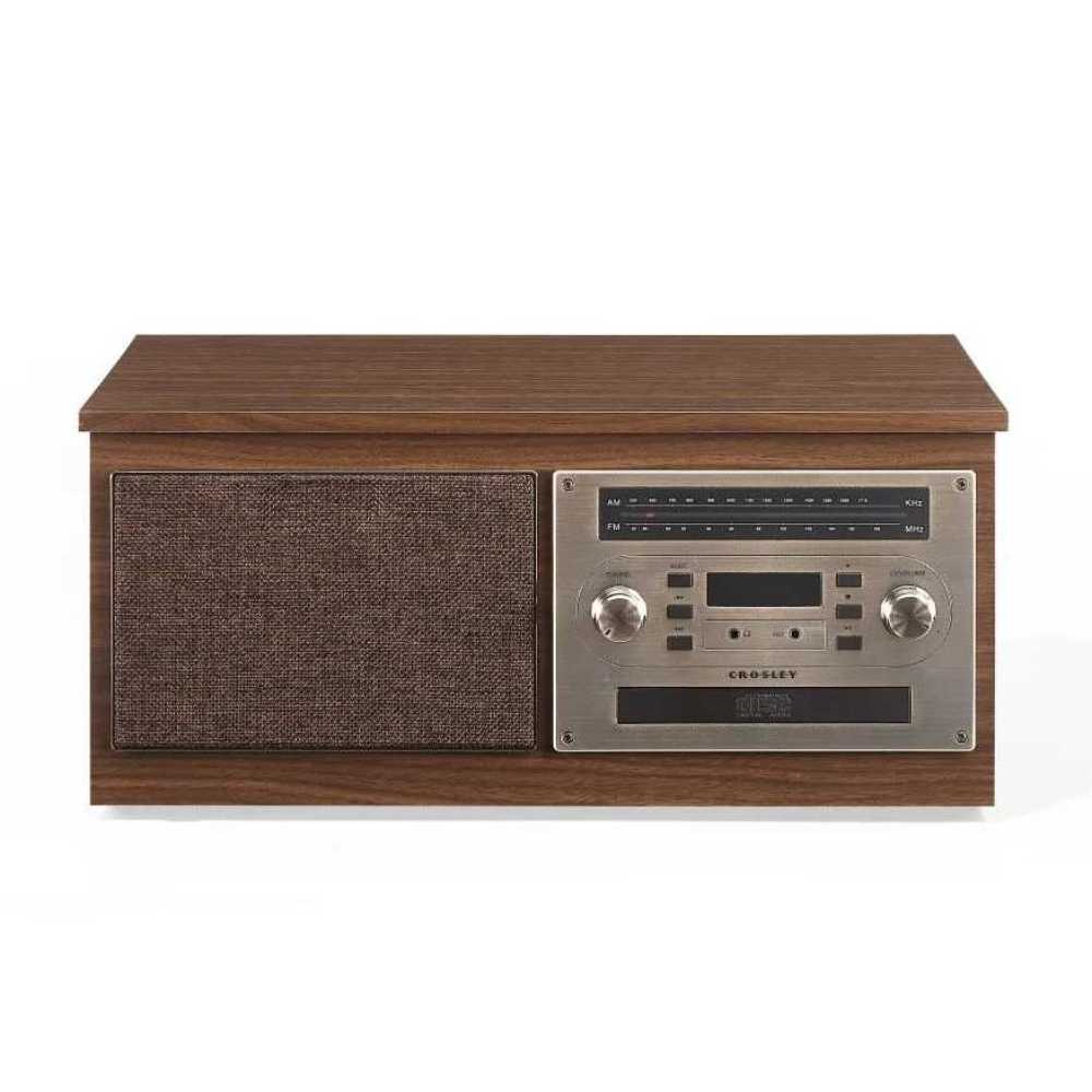 The front view of the Crosley Serenade 8-In-1 Record Player - Walnut highlights the textured speaker grille and retro control panel