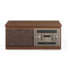 The front view of the Crosley Serenade 8-In-1 Record Player - Walnut highlights the textured speaker grille and retro control panel