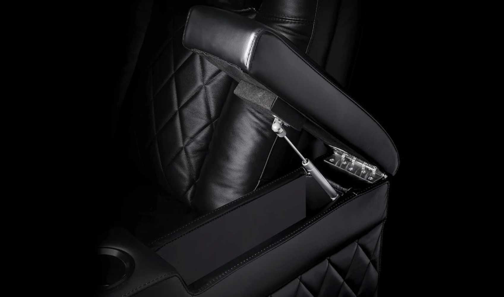 The hidden storage compartment within the armrest of the Valencia Tuscany Theater Seating with Risers