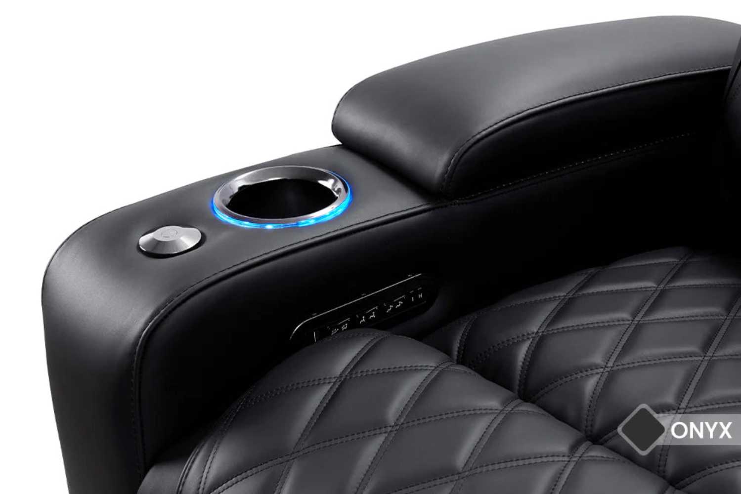 The image highlights the Valencia Oslo Luxury Edition Home Theater Seating’s controller panel with easy-to-use buttons for reclining, lumbar support, and RGB lighting