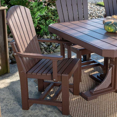 The image shows a LuxCraft Adirondack Arm Chair placed next to a matching outdoor table