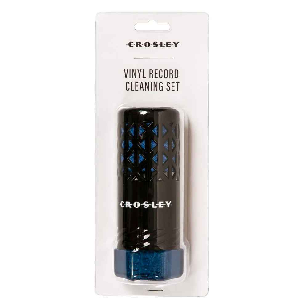 The image shows the Crosley Vinyl Record Cleaning Set in its packaging, including a black cleaning brush with a lattice design and a blue base