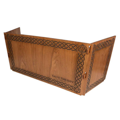 The image shows the Game Theory Tables DM 11 Privacy Shield in a natural wood finish with intricate Celtic knot patterns engraved along the borders