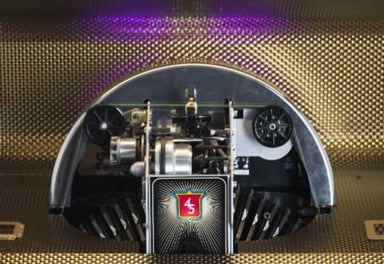 The inner workings of the Crosley Vinyl Rocket Full-Size Jukebox - Oak showcase intricate mechanical parts and a brightly lit retro-styled 45 emblem