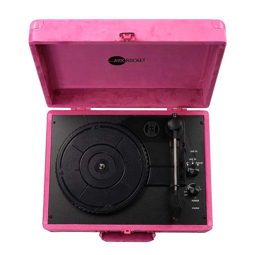 The inside of Arkrocket Curiosity Suitcase Bluetooth Turntable (Hot Pink Velvet) shows the circular turntable platter, stylus arm, and control buttons arranged neatly on a black panel