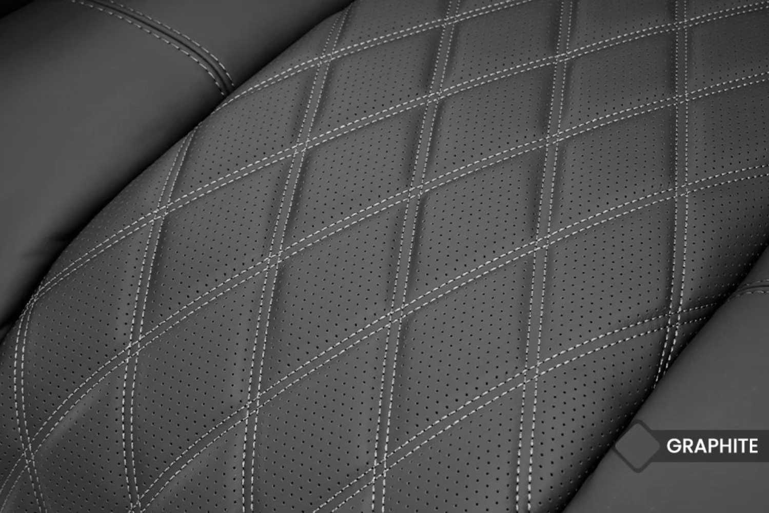 The perforated diamond-stitched graphite leather on the Valencia Tuscany Ultimate Edition Home Theater Seating