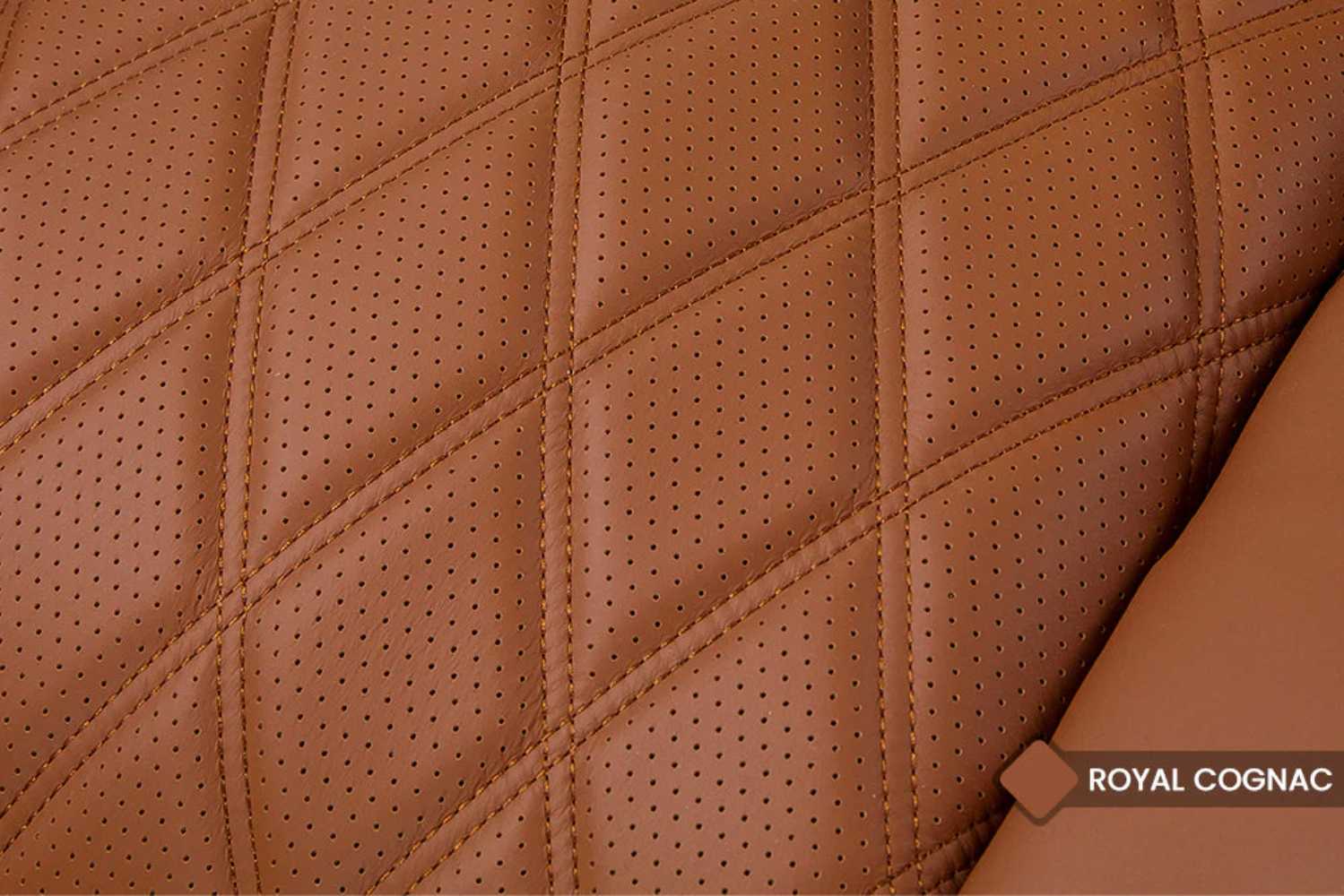 The perforated royal cognac leather with diamond stitching on the Valencia Tuscany Ultimate Edition Home Theater Seating