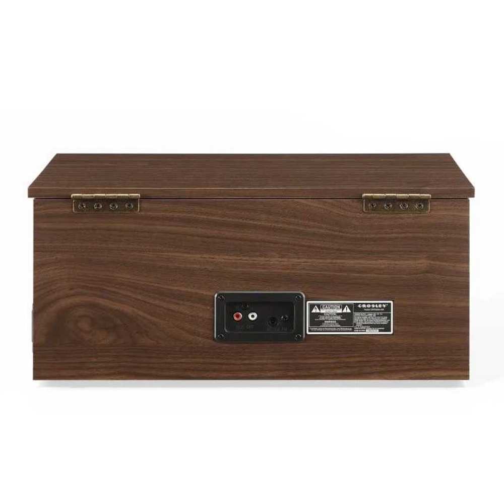 The rear view of the Crosley Serenade 8-In-1 Record Player - Walnut displays brass hinges, a power input, and audio output ports