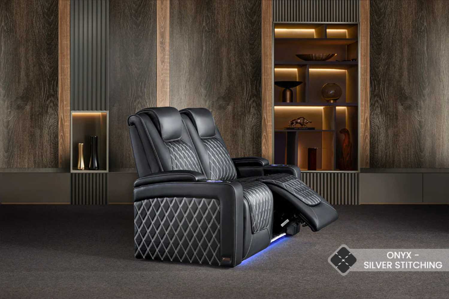 The reclining feature of the Valencia Oslo Ultimate Edition Home Theater Seating enhances comfort and style with its elegant silver-stitched design