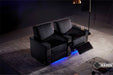 The top-down view highlights two Valencia Naples Prestige Home Theater Seating chairs with extended footrests and soft ambient lighting