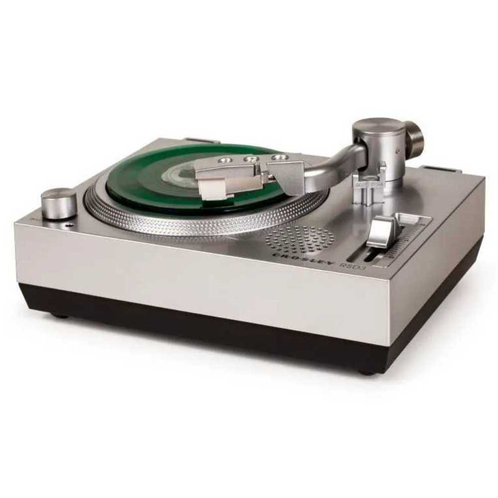 The turntable's platter and controls take focus in this tilted view of the Crosley RSD3 Mini Turntable for 3 Inch Vinyl Records w Sun Records Set of 4