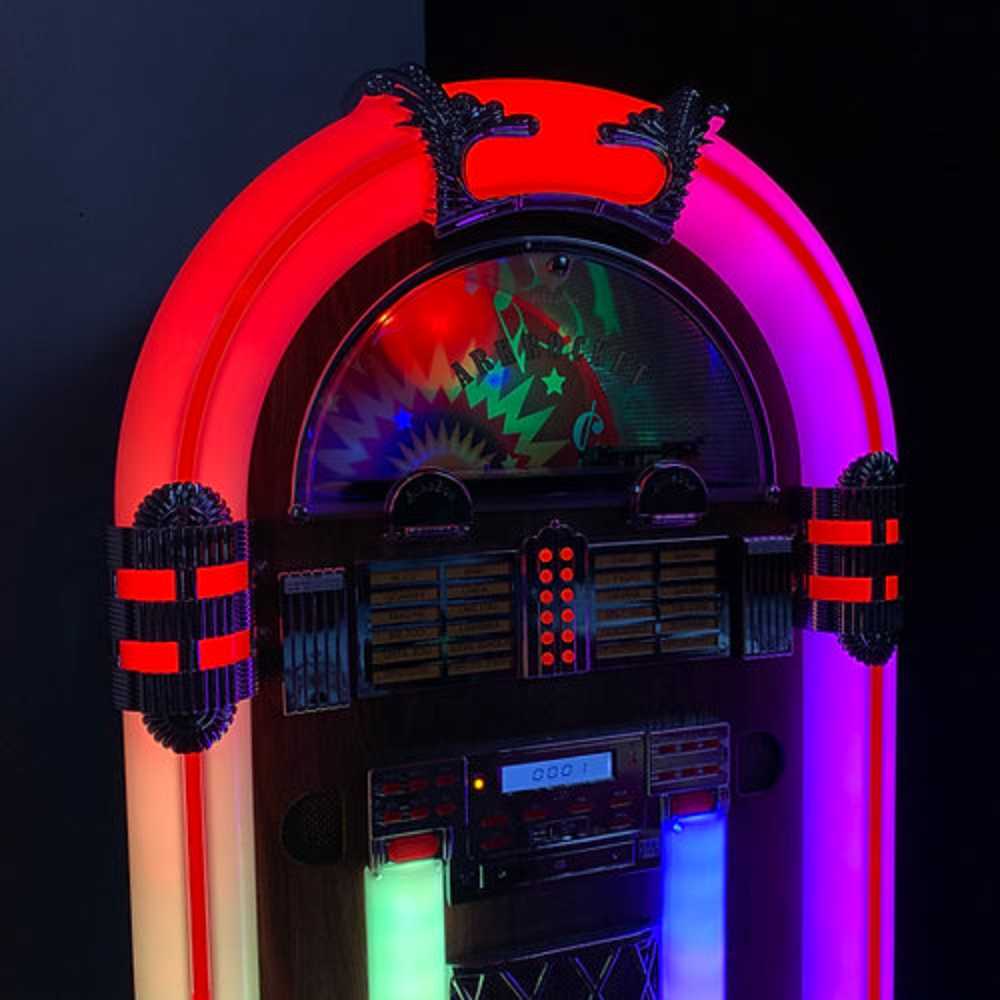 The vibrant neon lighting of the Arkrocket Saturn V Full Size Bluetooth Vinyl Record Jukebox