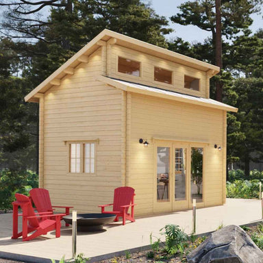 This corner view of Sawmill Structures The Versa 160 Atrium Loft 70MM Garden Room shows the cabin’s tall profile and inviting deck setup