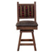 This rustic wooden seat with a patterned backrest and cushioned top is the Fireside Lodge Barnwood Colonial Swivel Barstool