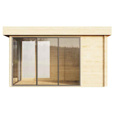 This side view shows the transparent glass facade of the GardenHouse24 USA ALU Concept 70M Garden Room, revealing its spacious, empty wooden interior