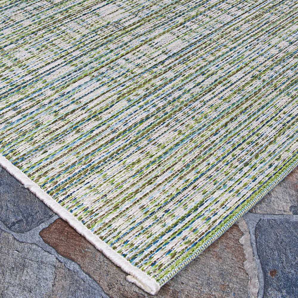 This angled view highlights the corner of the Couristan Cape Indoor/Outdoor Rug - Falmouth/Ivory-Hunter