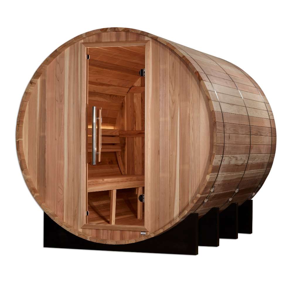 Three-quarter view of Golden Designs Klosters 6 Person Barrel Traditional Sauna showing its glass front, cedar benches and the steel bands around the barrel