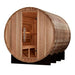 Three-quarter view of Golden Designs Klosters 6 Person Barrel Traditional Sauna showing its glass front, cedar benches and the steel bands around the barrel