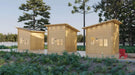 Three identical Sawmill Structures Cube Loft 100 Garden Room units line a forest path