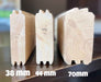 Three wooden log wall samples labeled 38mm, 44mm, and 70mm demonstrate the wall thickness option used in the Sawmill Structures The Versa 160 Atrium 70MM Garden Room