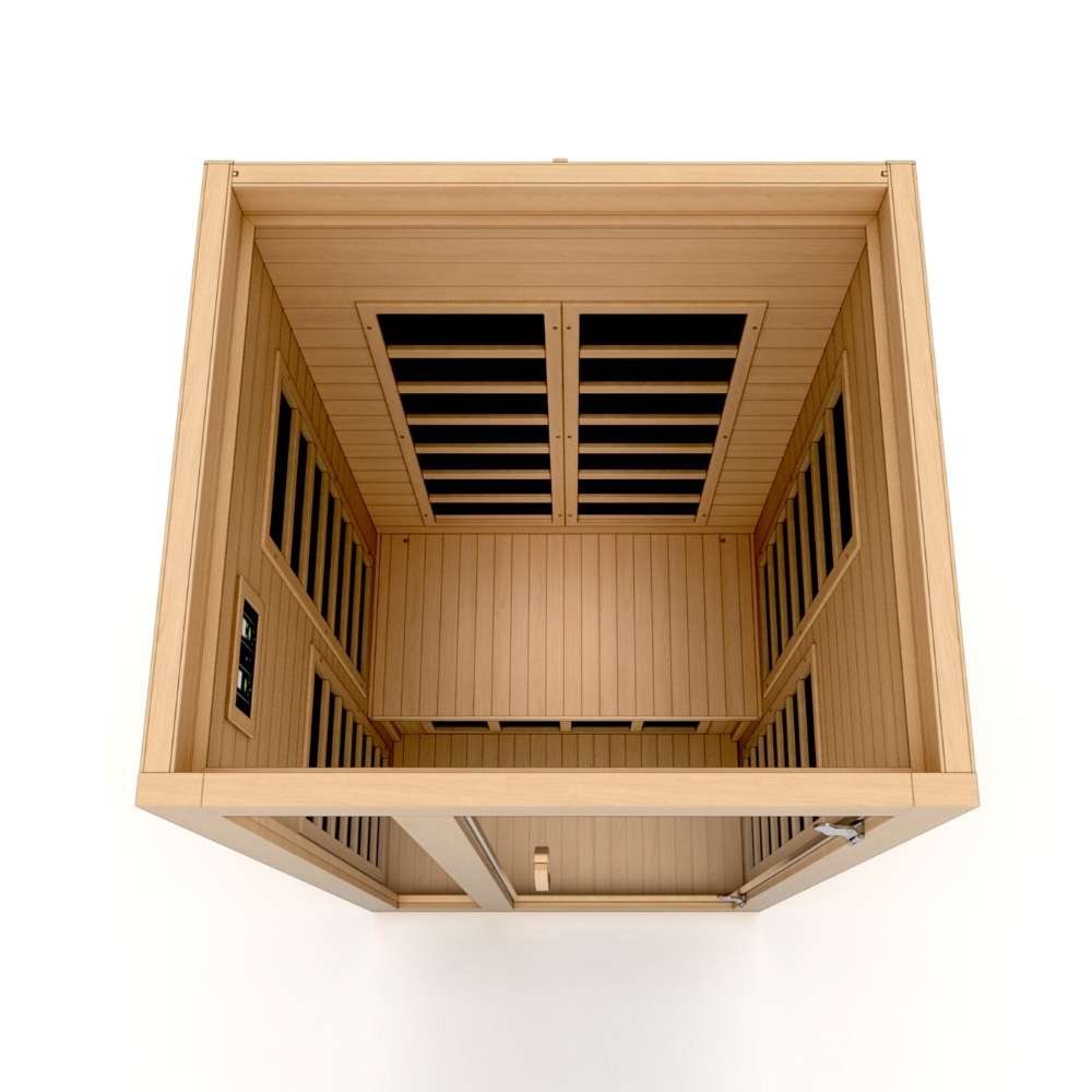 Top-down view inside Golden Designs Dynamic Gracia 1-2 Person Low EMF Far Infrared Sauna showing carbon panels on the walls and a light hemlock floor
