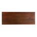Top-down view of Crate & Barrel Raffael Carved Wood Executive Desk showing the smooth rectangular wood work surface