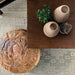 Top view of a styled living space with decor items placed on the Couristan Liguria Indoor/Outdoor Rug - Sarzana/Dove Grey