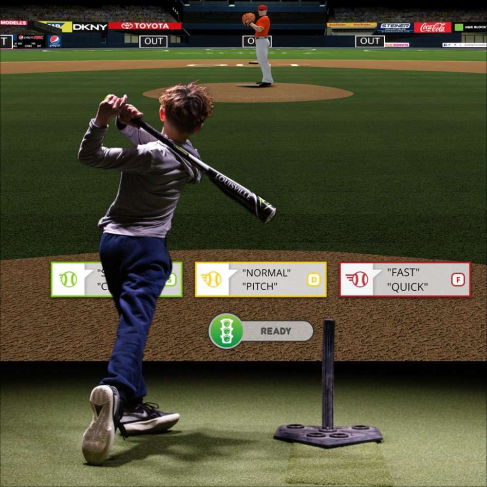 TruGolf MultiSport Arcade Sports Software & Camera displays a child swinging a bat at a virtual baseball pitcher on a large screen