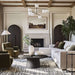 Two Crate & Barrel Annie 38" Charcoal Brown Storage Cabinet units flank a fireplace in a bright, modern living room