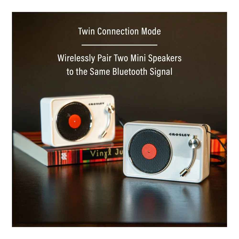 Two Crosley Mini Turntable Bluetooth Speakers - White are paired wirelessly using the twin connection mode