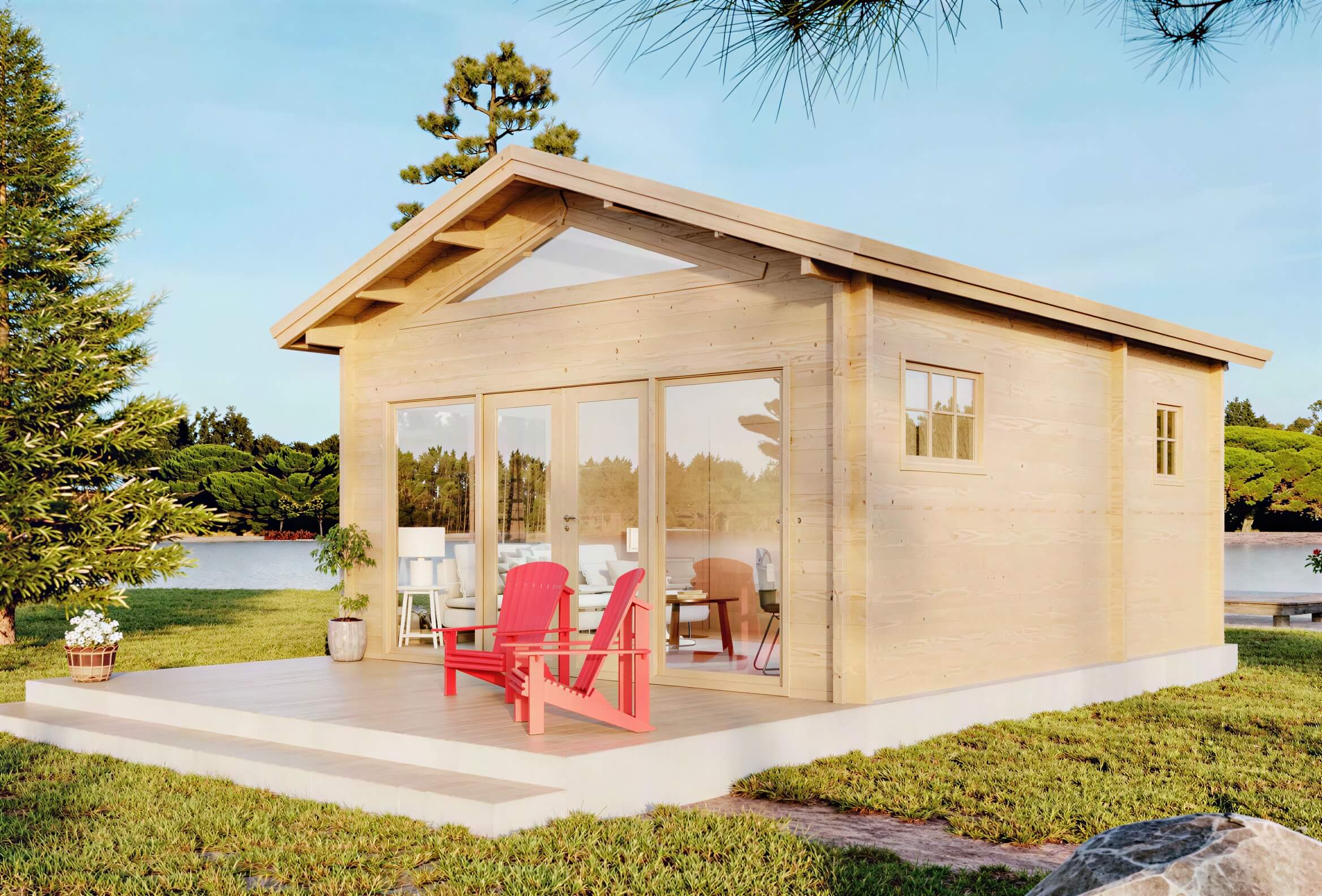 Two bright red chairs sit on the front porch of a cozy wood cabin beside a lake, showcasing the Sawmill Structures Edwin Lake House 70MM Garden Room